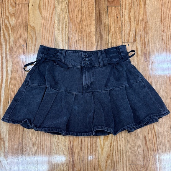 Social Collision Dresses & Skirts - Social Collision Black Wash Pleated Ruffle Mini Skirt with Lace-Up Front Detail